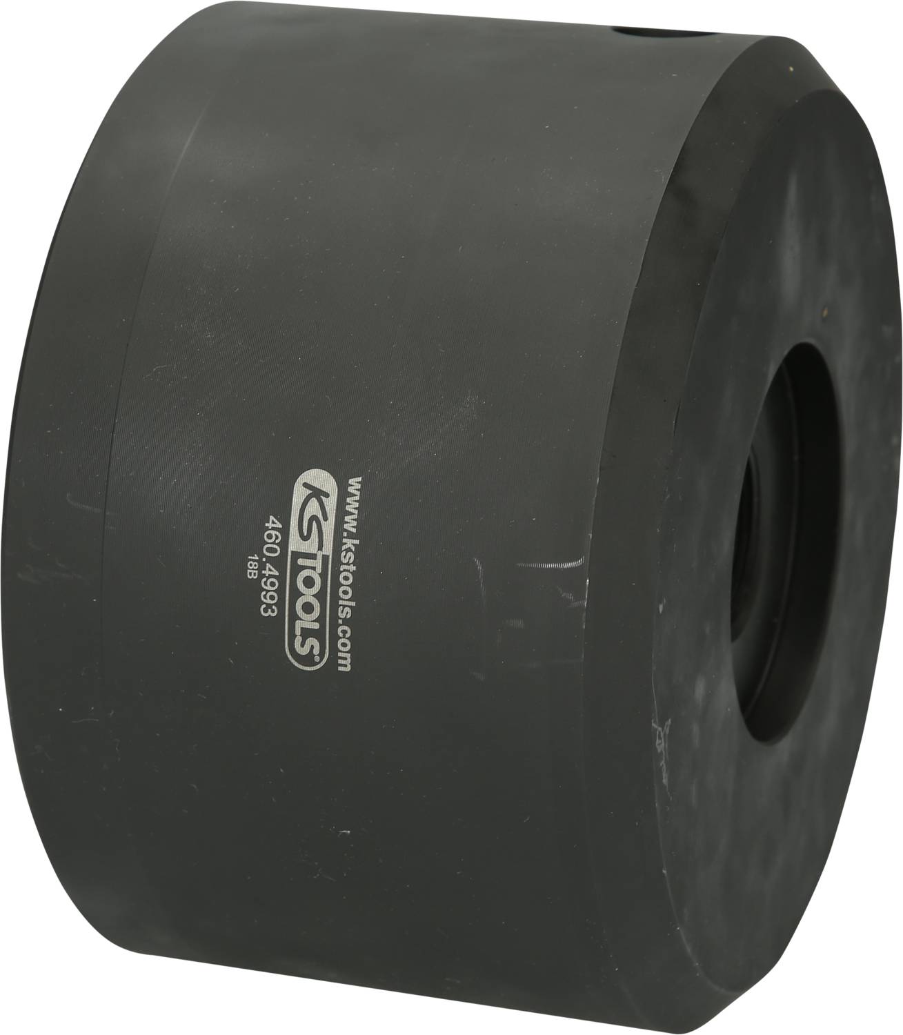 Large, black, cylindrical rubber damper with 'KS Tools' inscription. Used for shock absorption or vibration reduction.<br><br>Large, black, cylindrical rubber damper with the 'KS Tools' marking. Used for shock absorption or vibration dampening.