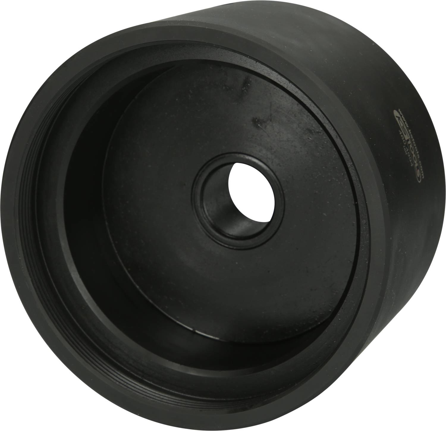 Black, cylindrical wheel with a central hole, likely part of an industrial or mechanical device.