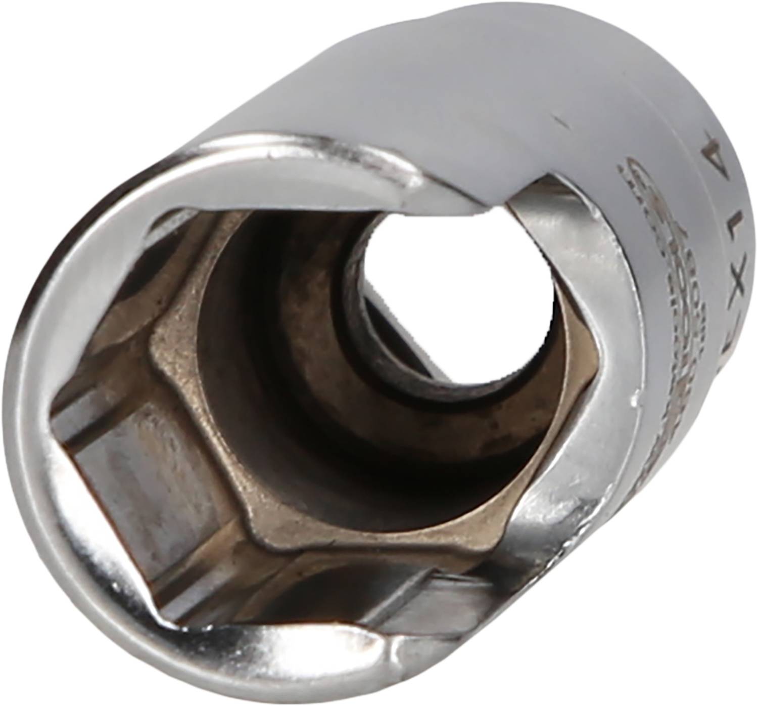 A silver pin nut, cylindrical in shape, with a square hole for attaching to tools; marked with measurement markings around the edge.