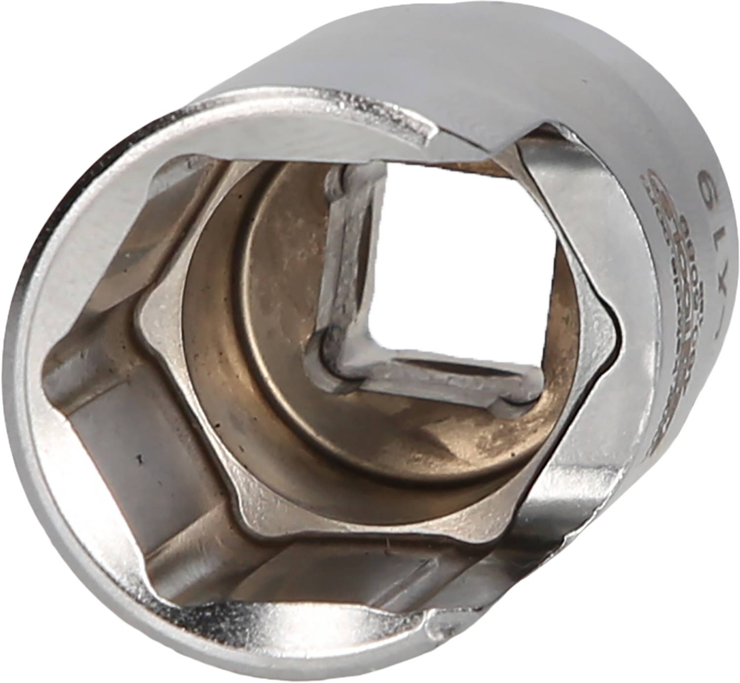 Close-up of a metal hexagonal socket nut with a square opening, used for bolts and nuts.