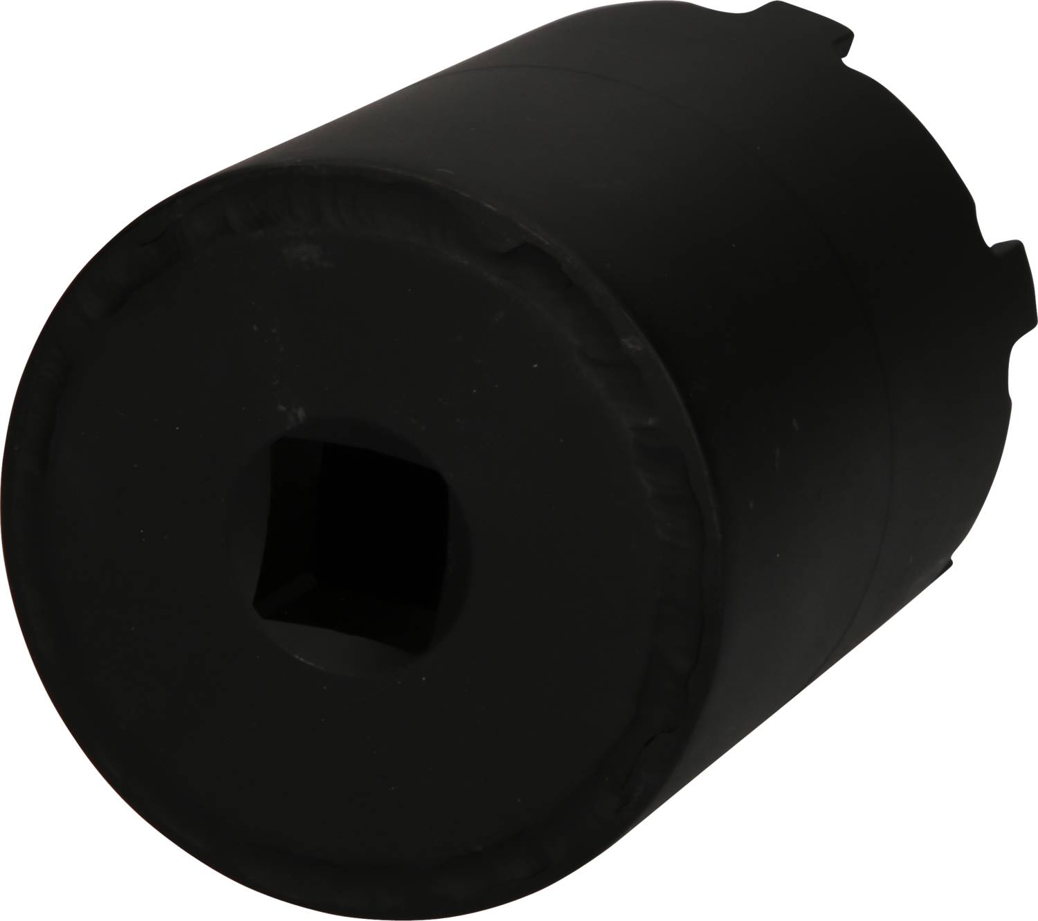 A black cylindrical tool for releasing locks on petrol tanks, with a square insert on the front side.