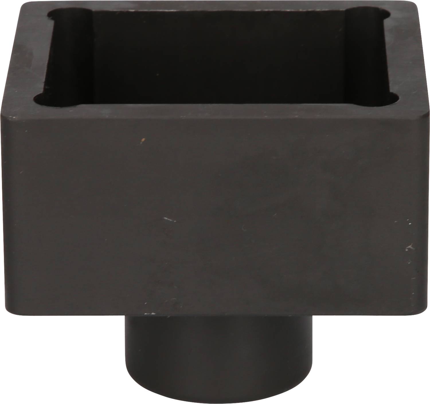 Black, square metal piece with a rectangular opening at the top, used as an adapter in mechanical engineering.