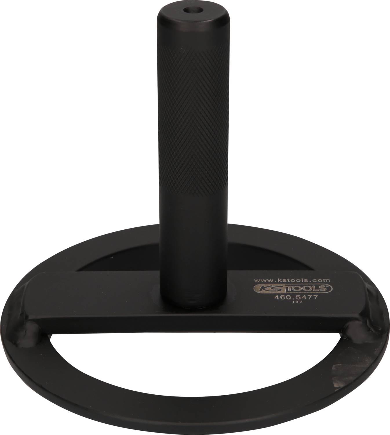 Black, round punch die with handle. Used to precisely cut shapes from thin materials such as gaskets.