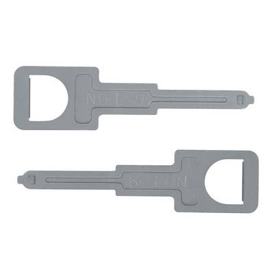 Two grey plastic parts shaped like key inserts. One is marked 'NO E-9', the other '6-10'.