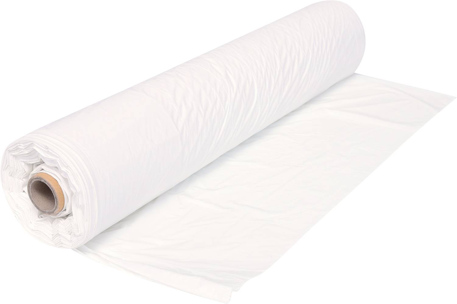 A large roll of white fabric lies unfolded on a table, ready to be cut or sewn.