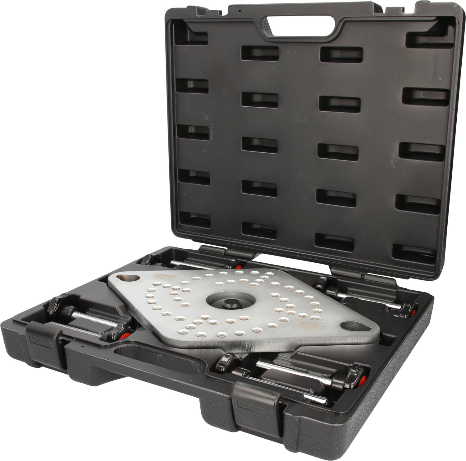 A black tool case, opened, reveals a metal plate and several attached tools or accessories inside.
