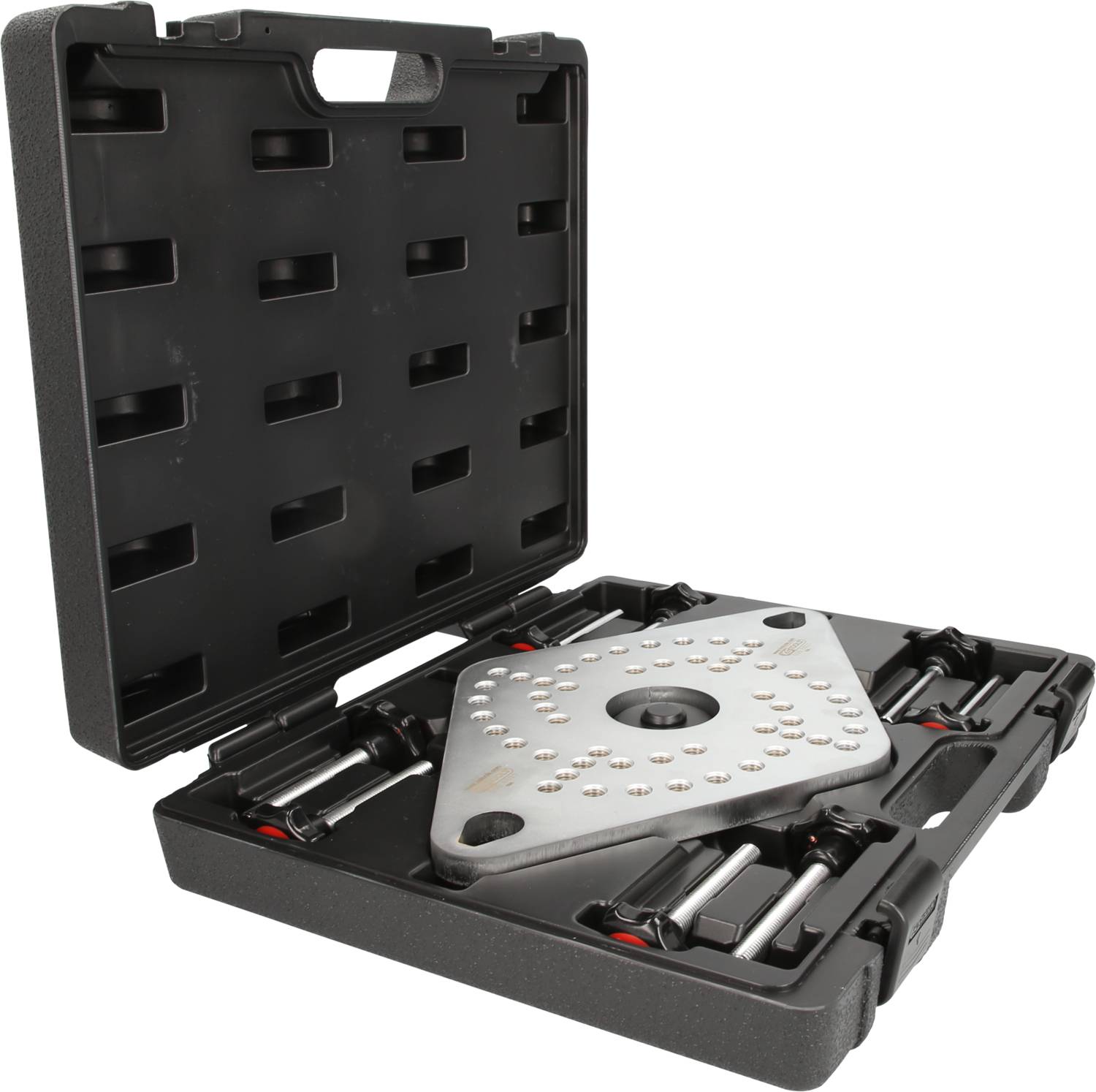 An open black plastic case contains a triangular automotive tool with multiple metal rollers, used for positioning.