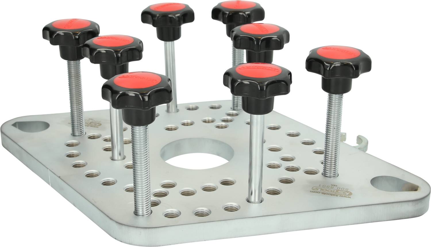 Metal plate with numerous holes and several vertically mounted screws, which are fitted with black and red handles.