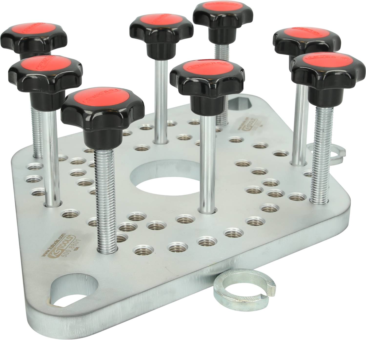 A metal board with multiple adjustable screw clamps in black colour with red handles for securing workpieces.