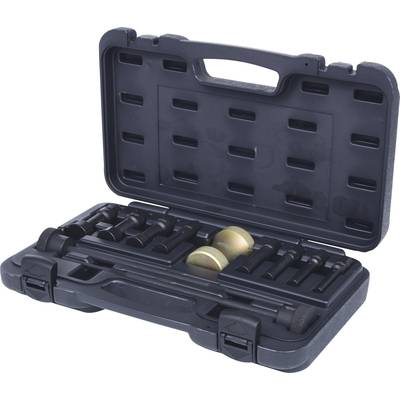 Open black toolbox with various tools and accessories, including two round, gold-coloured objects.