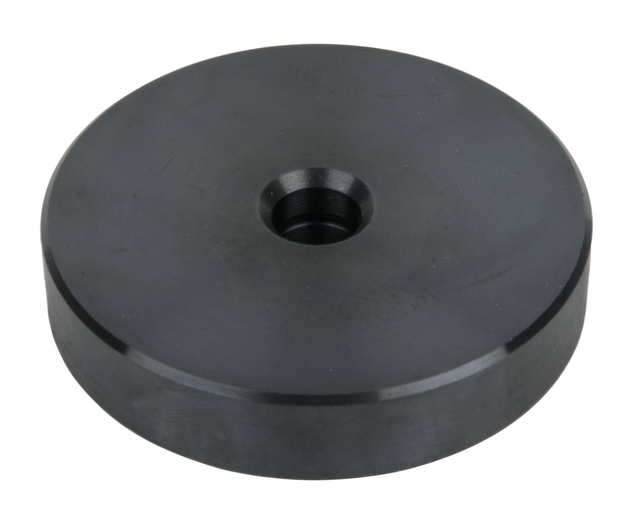 Round, flat metal disc with a central hole.