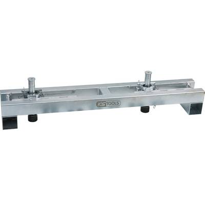 A silver-coloured tool with two adjustable levers on a rectangular frame, bearing the 'KS Tools' logo. Primarily made of metal.