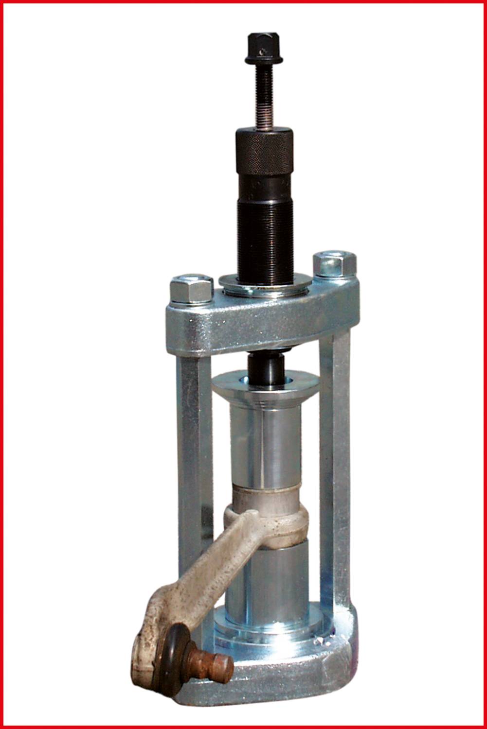 A metal puller tool. It is used for removing bearings or bushes and consists of a central screw mechanism with a gripping mechanism underneath.