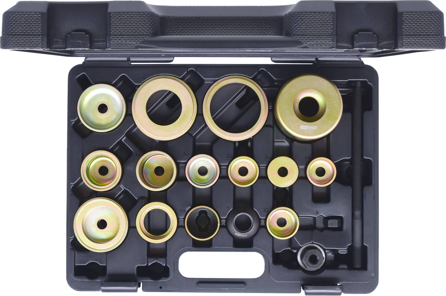 An open tool case with various round metal attachments of different sizes and diameters, neatly arranged.