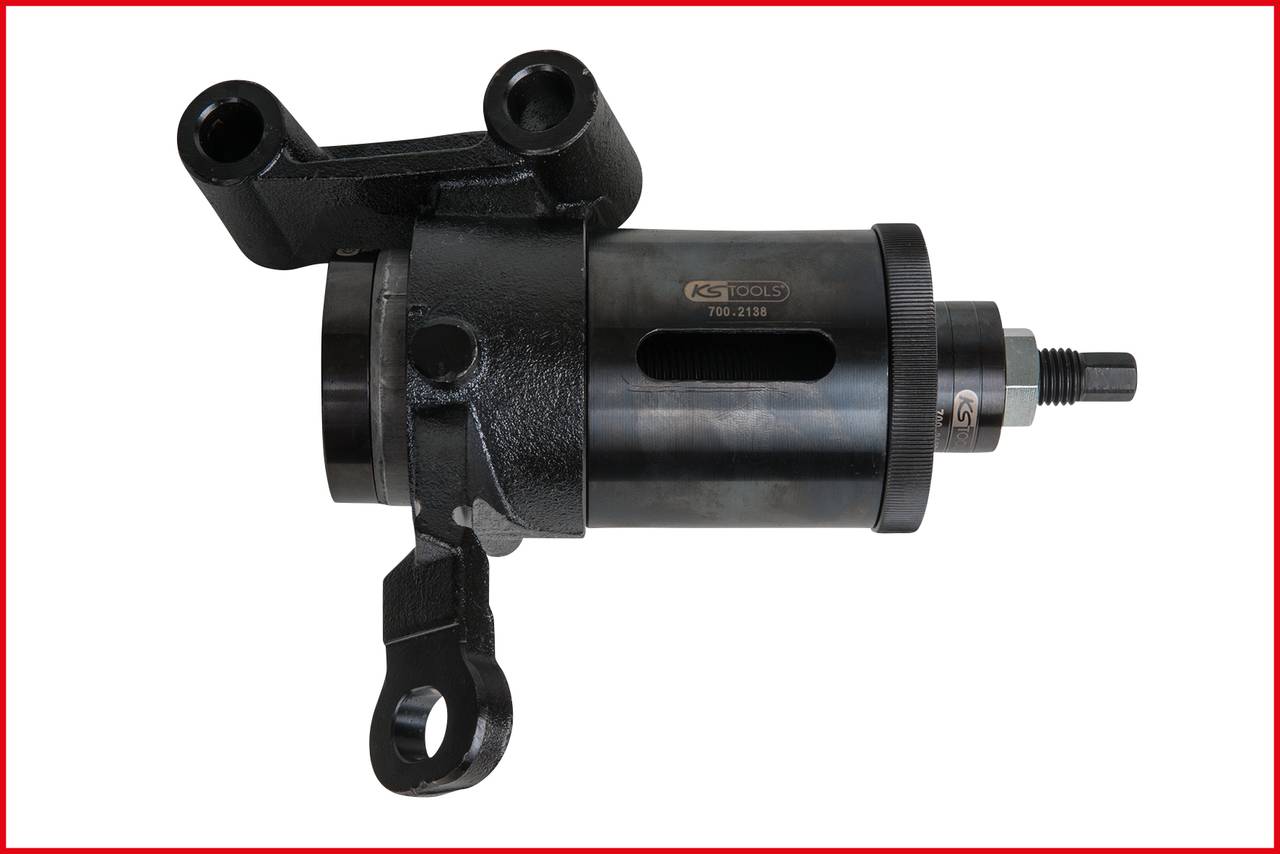 A black automotive component with a cylindrical body and fixings at each end, centrally positioned in the middle of the image.