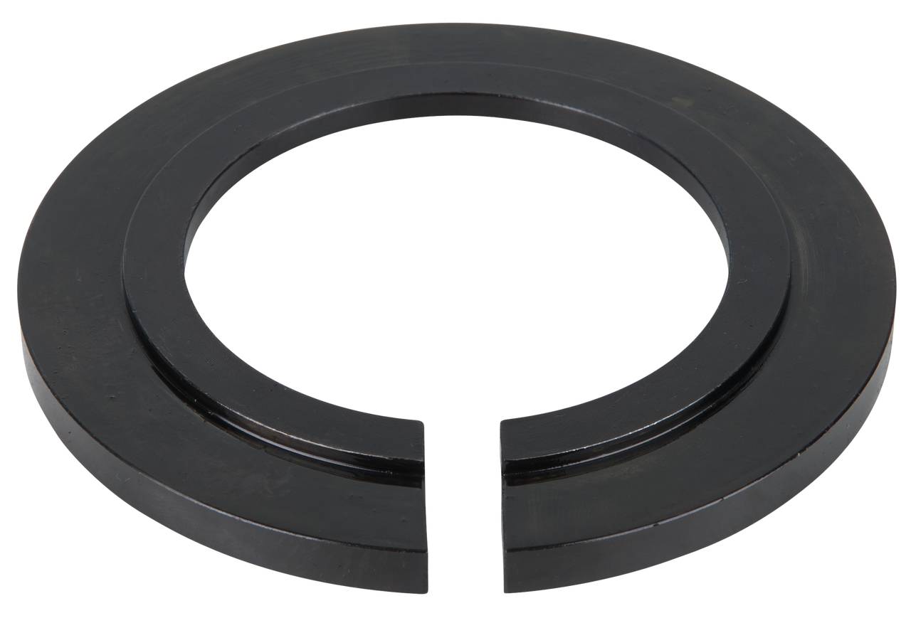A black, ring-shaped splitting wedge with a wide, lateral incision is used for fixing and stabilising components.