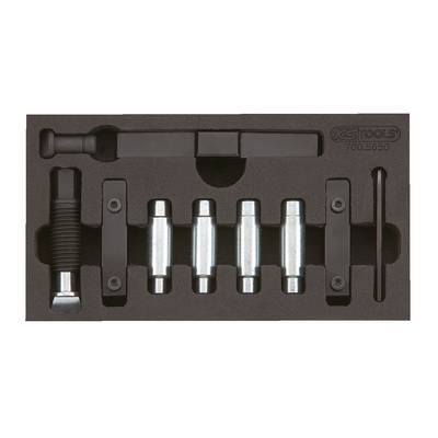 'Set of metal tools in foam lining, comprising a slider and five cylinders, used for mechanical work.'