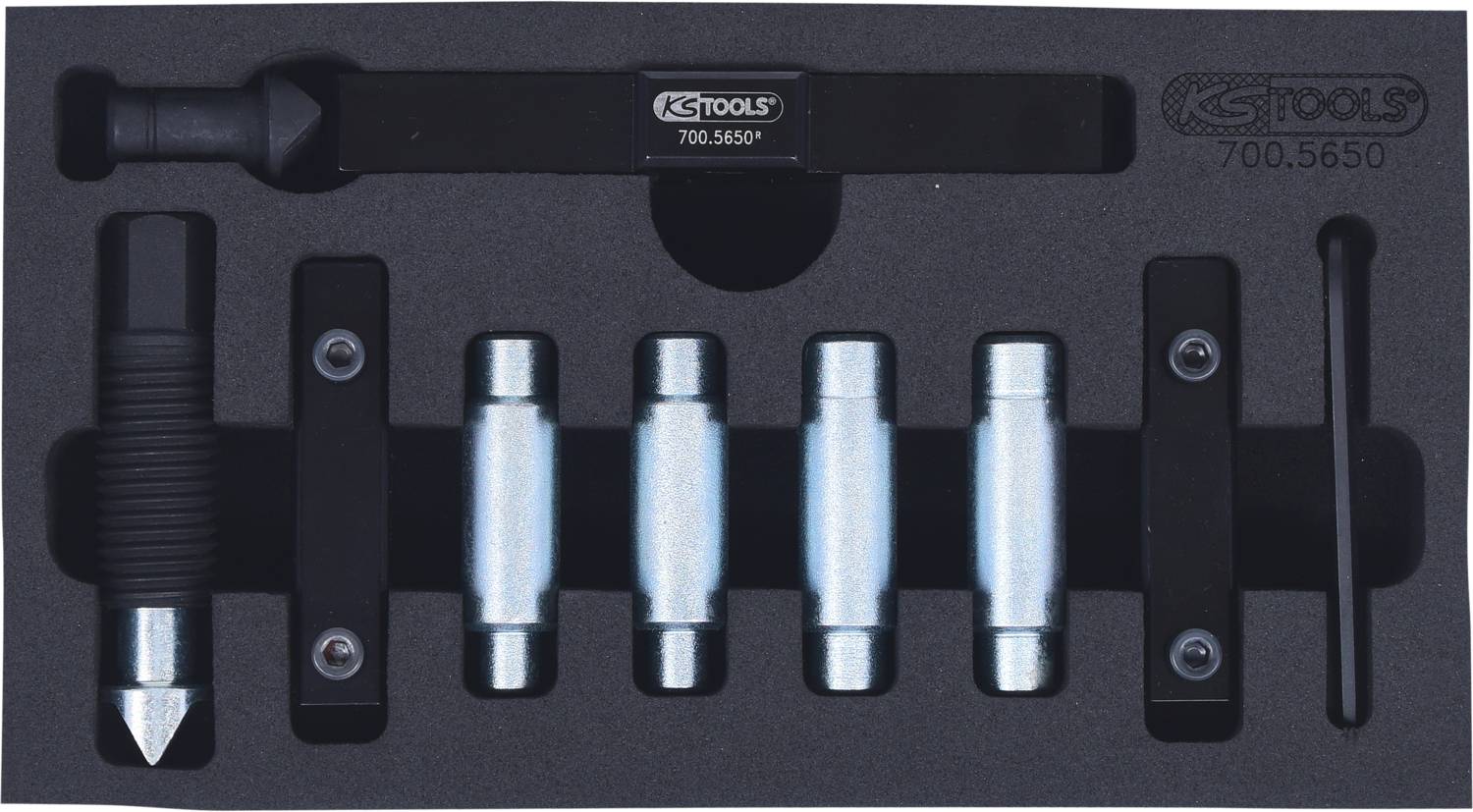 'Set of metal and plastic pens and holders in a foam insert. Contains various tool-specific parts.'
