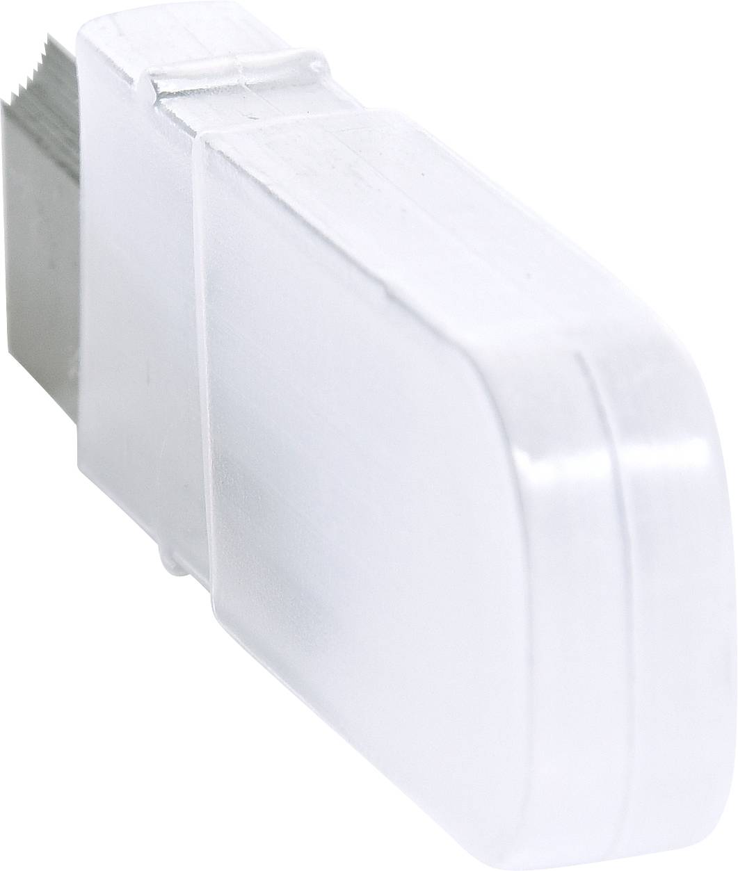 A close-up of a white plastic object with a rectangular shape and rounded corners.