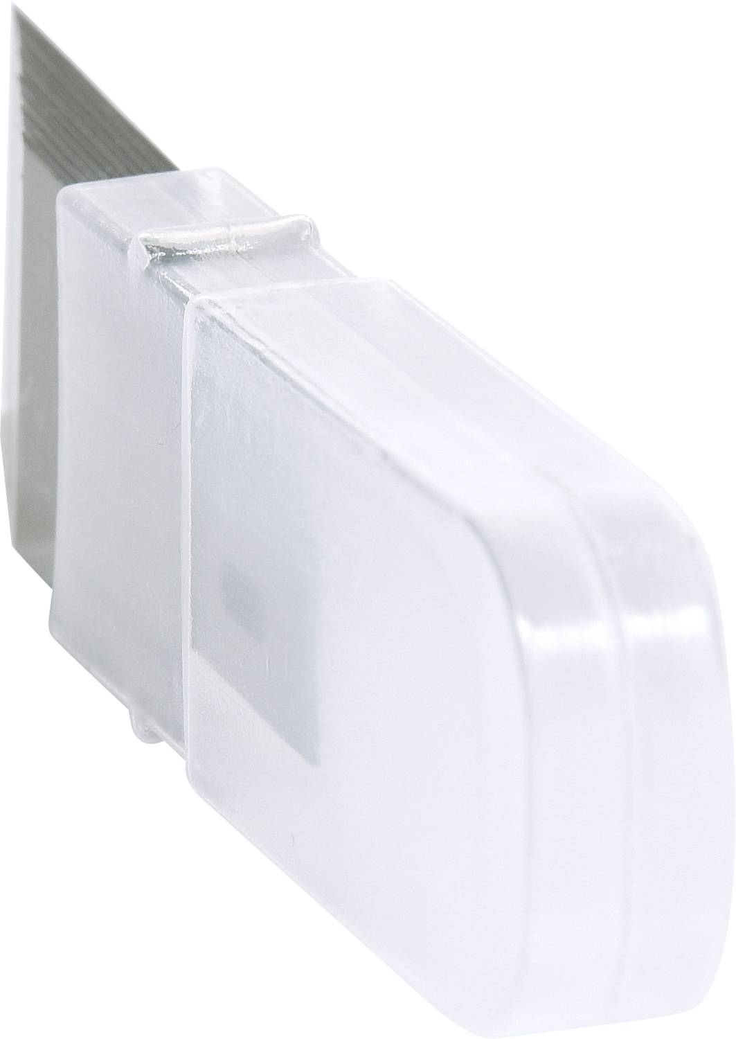 A white plastic cap protection on a blade. The cap partially covers the sharp metal blade.