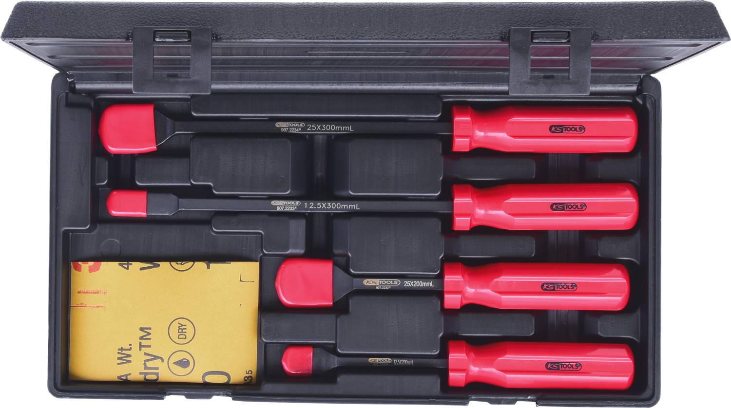 An open case containing five red screwdrivers of varying sizes and a piece of sandpaper.