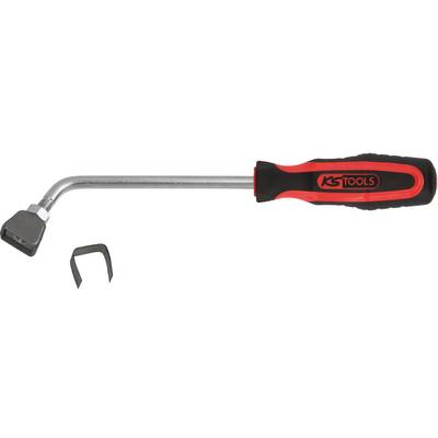 Tool with a long handle and angled head, possibly a clamping tool. A small metal clip lies beside it.