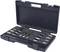 A sturdy tool case with multiple compartments containing various metal inserts. Simple storage solution for tools.