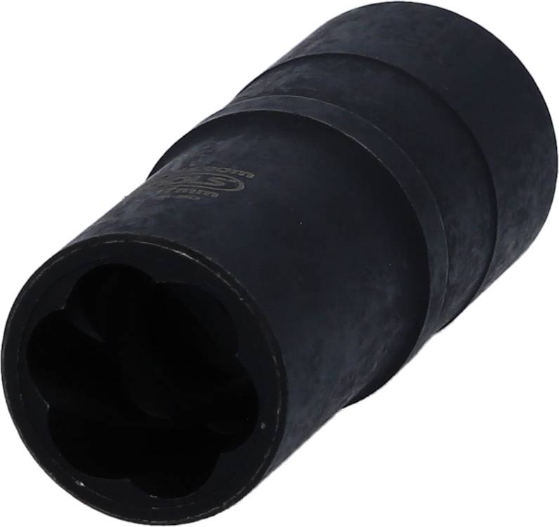 A black metal component from a kitchen sink. It has a cylindrical shape with a hexagonal inner profile.
