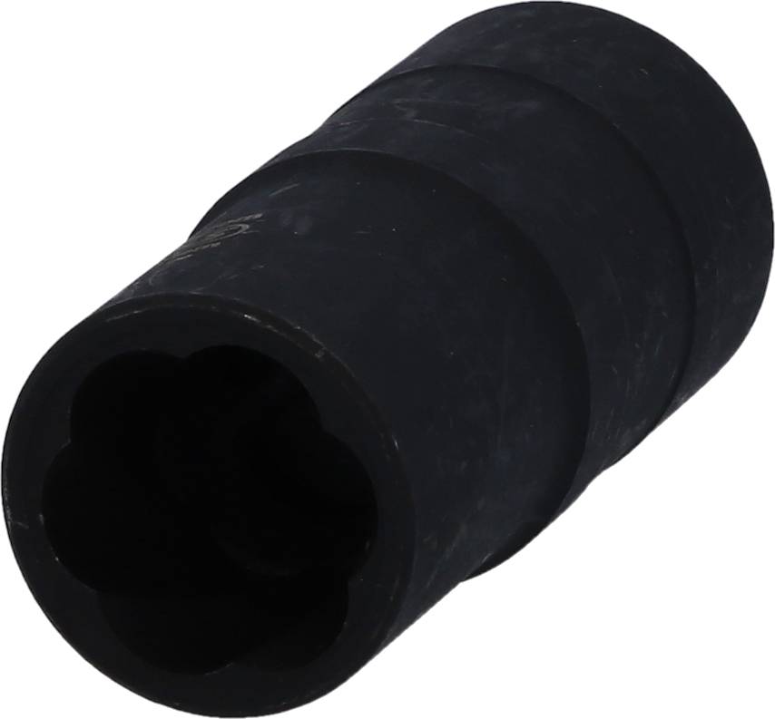 Black, cylindrical component that looks like a socket. It appears to be made of plastic or rubber.