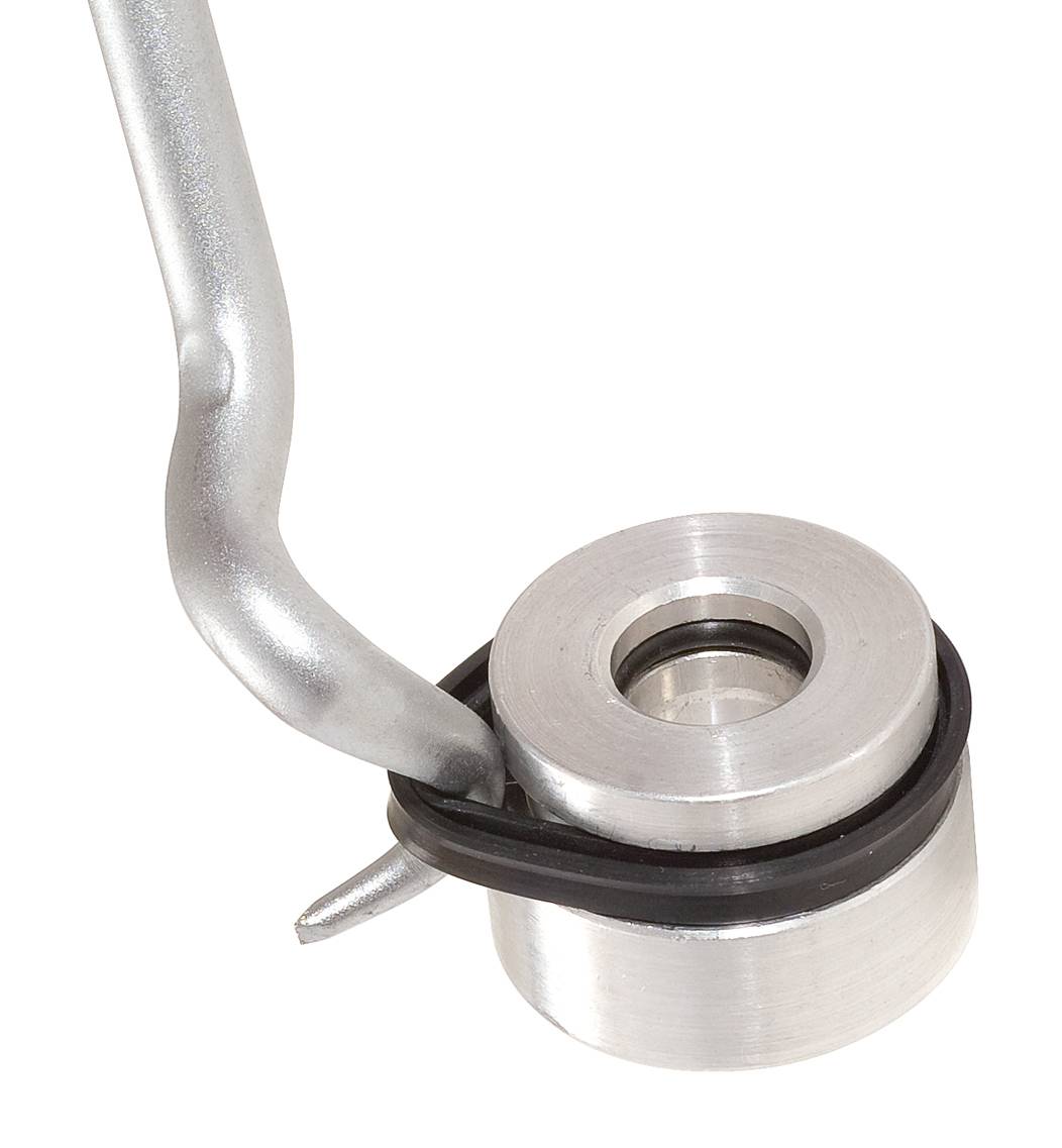 Metallic car component with a curved pipe and a round, cylindrical connection.