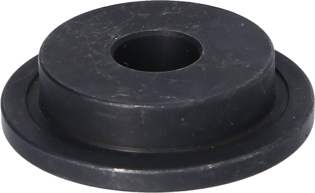 A black, round plastic stopper with a central opening, typically used as a seal or closure.
