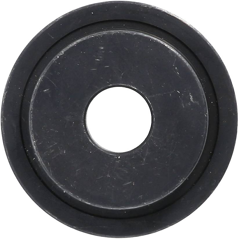 A flat, round metal disc with a hole in the centre, similar to a washer, on a white background.