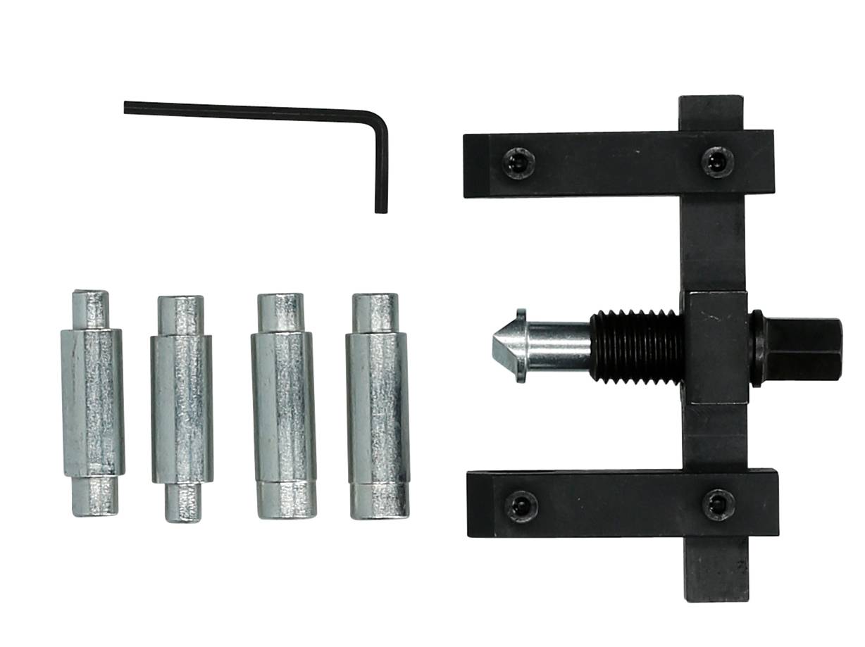 'Injection pump mounting tool with three metal attachments, an Allen key and a black metal bracket for engine repair.'