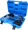 An open blue plastic case displays a bearing puller set with various round attachments and tools.