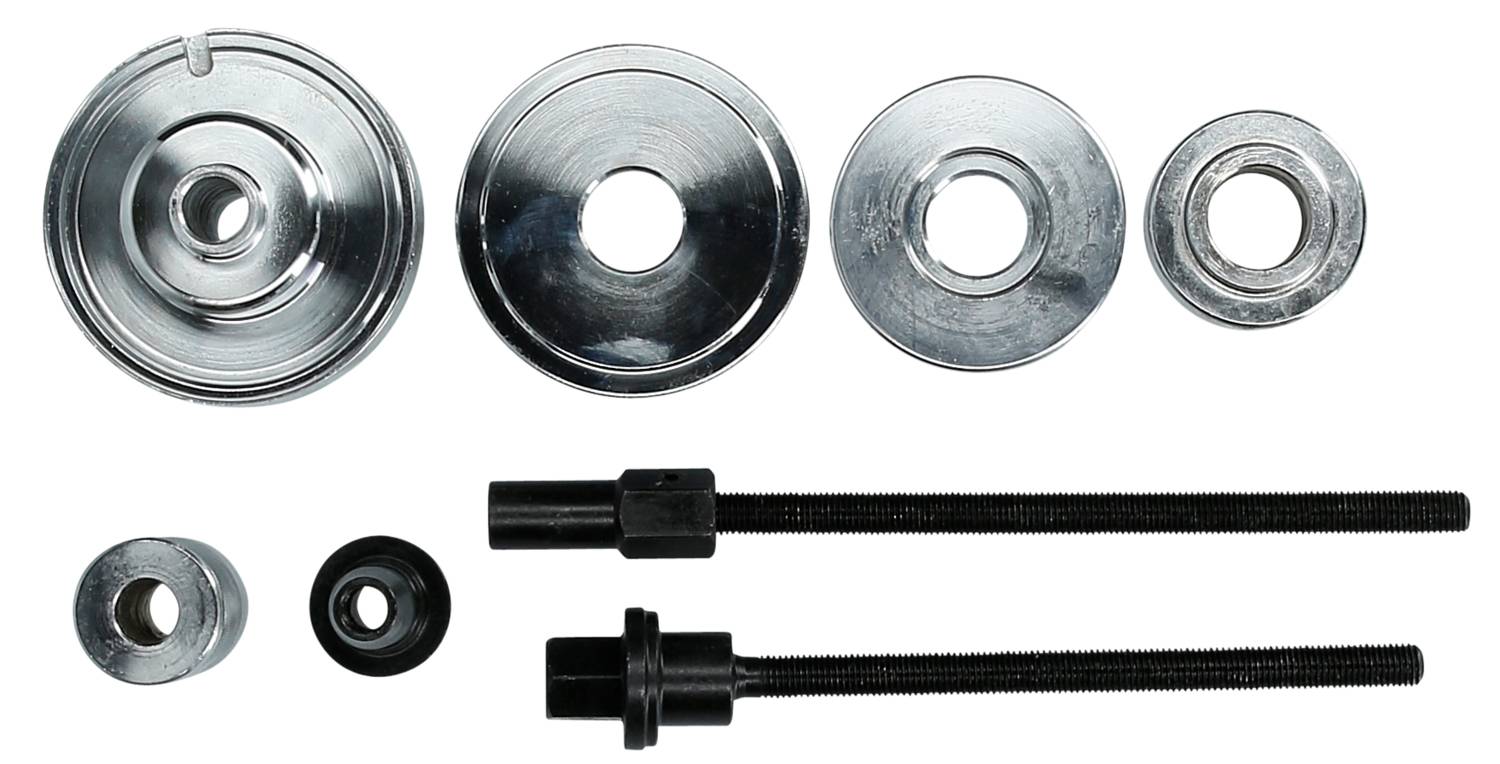 Metal Parts and Tools: Various round metal discs and two black threaded bolts with matching nuts.