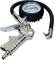 Tyre Pressure Gauge with Manometer and Hose. Silver casing, circular display field with colour scale for pressure measurement in bar and psi.