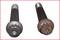 Two steel bolts in the image: on the left, a new, shiny bolt, on the right, a rusty, heavily corroded bolt. Comparison of condition.