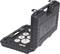 'Open black toolbox with six white discs and a silver component. KS Tools logo on the lid.'