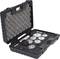 Black plastic carrying case with foam padding, contains precision pressure measuring instruments and adapters.