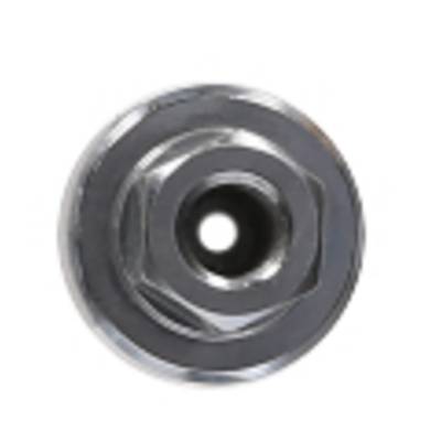 Metallic hexagonal fastener with a central hole against a white background, suitable for applications in mechanical engineering.