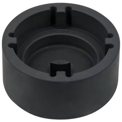 A black, round plastic component with multiple recesses and cutouts. Potentially used as a mounting or protective cap.
