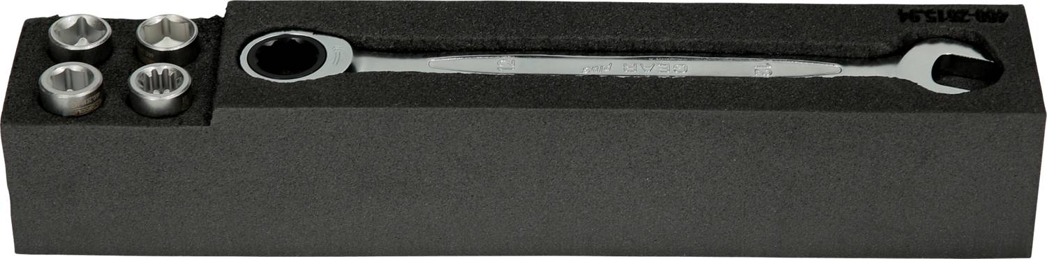 Four socket wrenches and a combination spanner are nestled in a black foam insert.