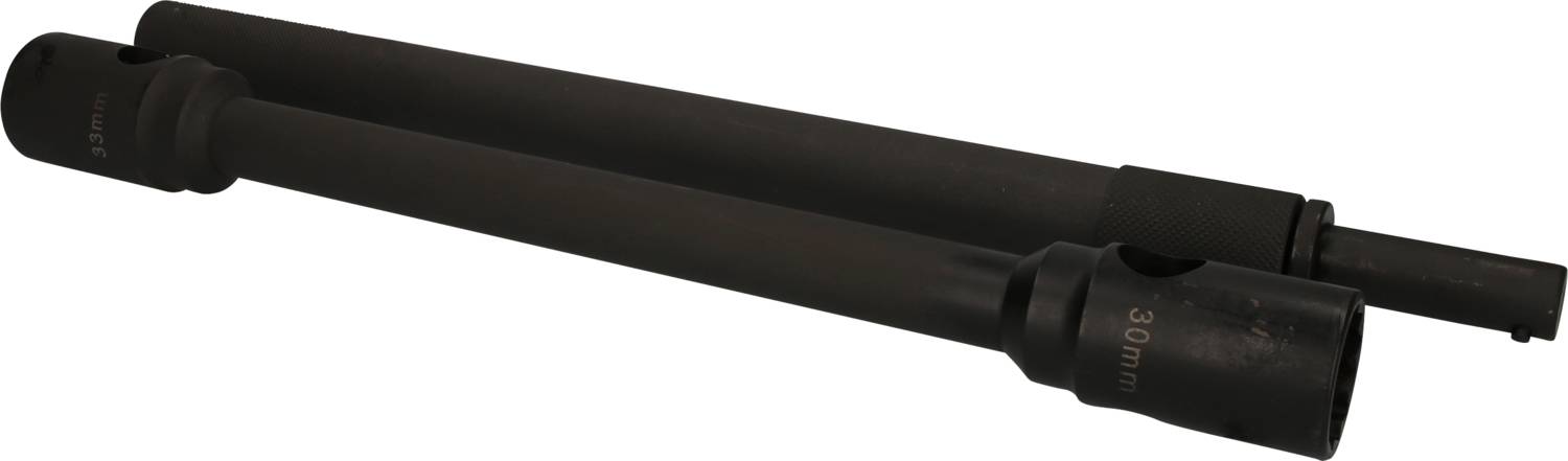 Two black metal pipes, lying parallel to each other.