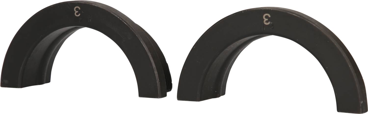 Two black, semi-circular objects with the number '3' on them.