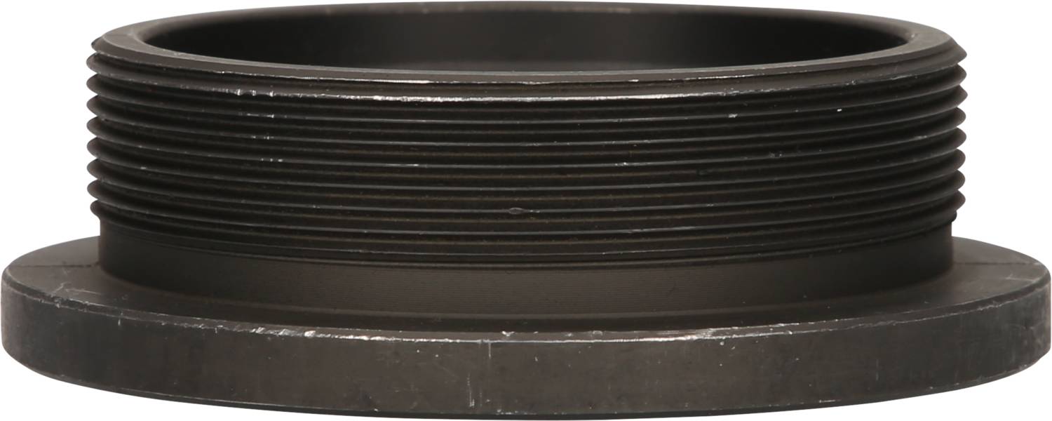 Black metal ring, flat and round with thread, lies on a flat surface.