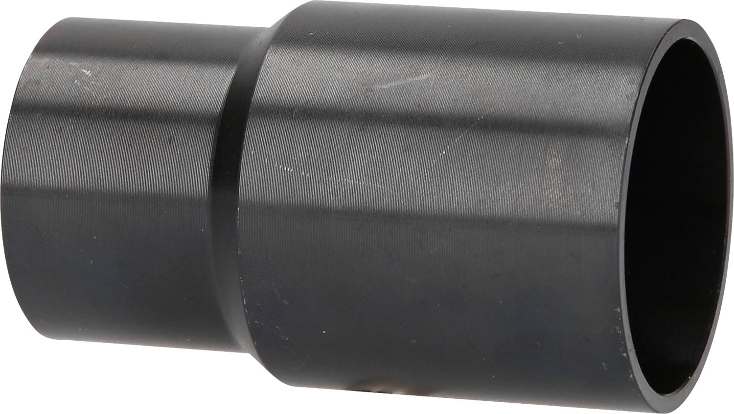 A grey, cylindrical metal piece that tapers from a thin edge to a thicker section.