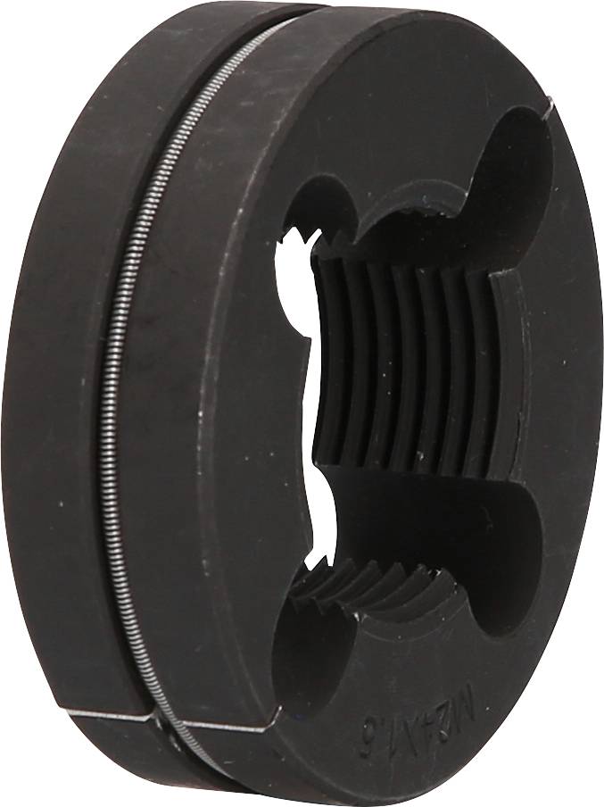 Black replacement part in a round shape with a grooved inner area and external wire. Potentially a component of a mechanical device.