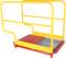 Yellow safety barrier for loading bays. Red and silver floor with metal grating and checker plate. High for additional work safety.