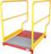 Yellow safety barrier with red and silver flooring. Safety platform or gangway.