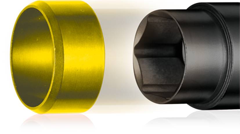 A yellow and a black cylinder which are attached to each other. The yellow cylinder is shorter, the black one longer.